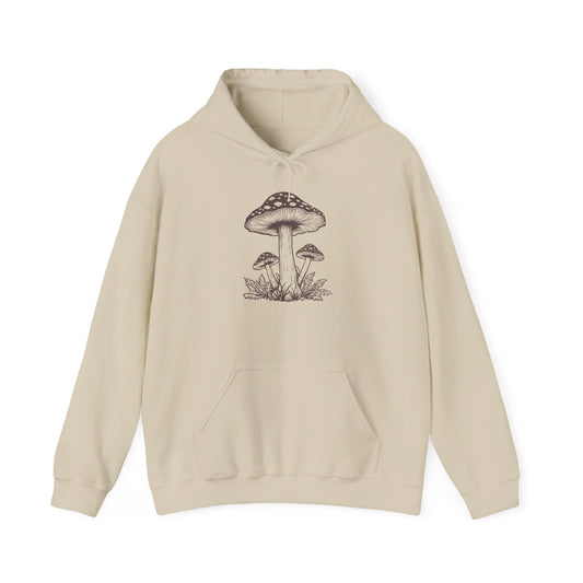 Hippuli brändin beige unisex huppari, jossa on tummanruskealla piirretty kärpässieni.